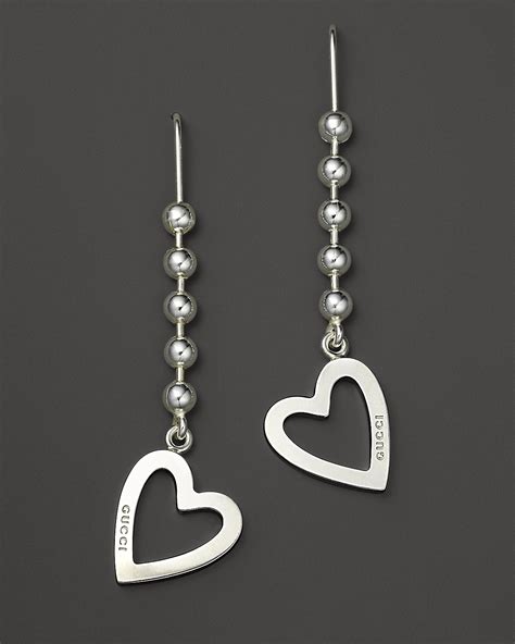 gucci earrings trademark|gucci heart toggle earrings.